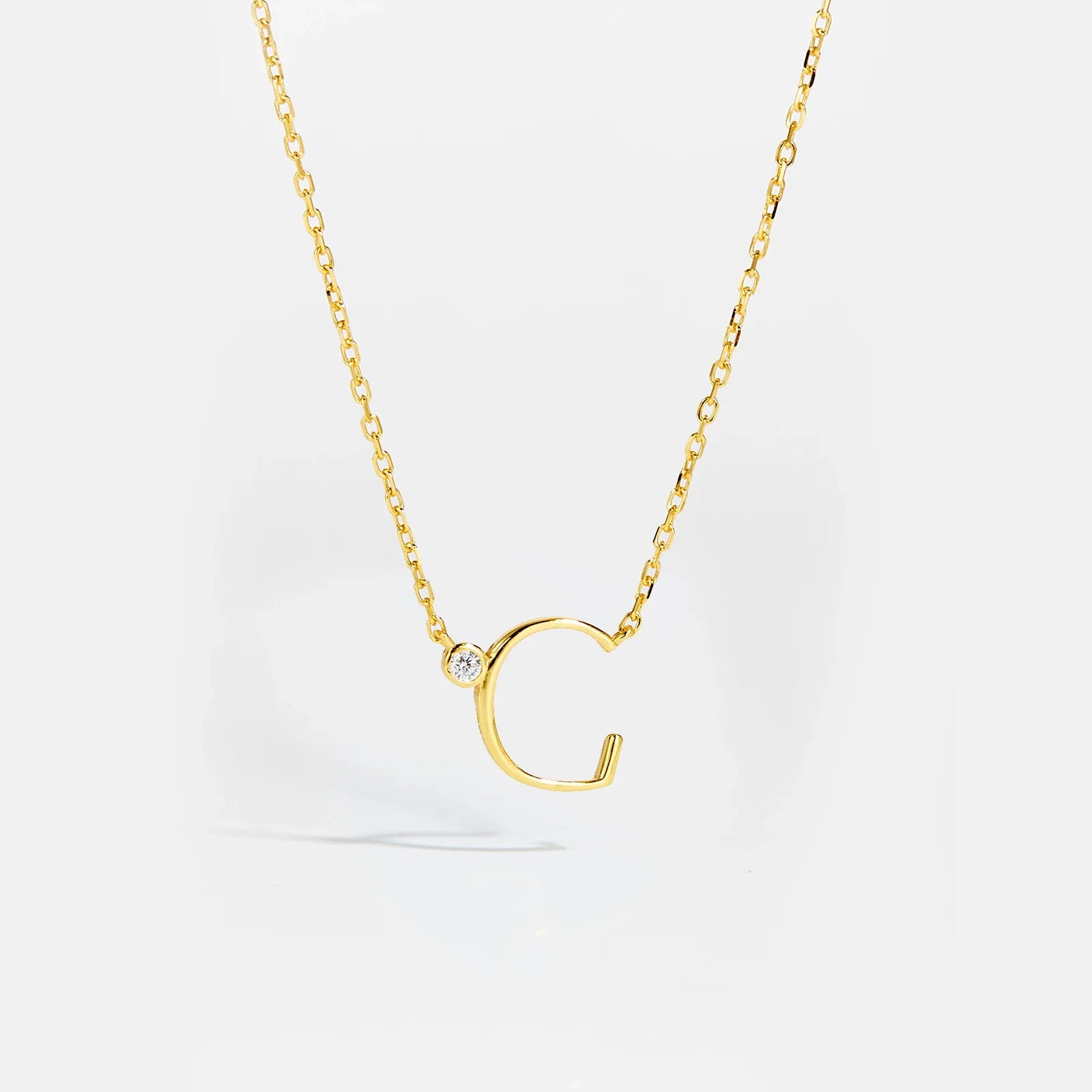 Initial Letter And Shiny Dot Necklace